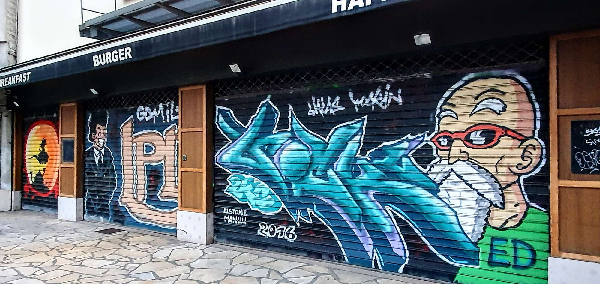 
								Street-art graffiti fresque 
								Elston Manuu 
									13 Boulevard Diderot
									75012
									Paris
									France 
									Pat Finder
								Street-Art-Safari.com
								