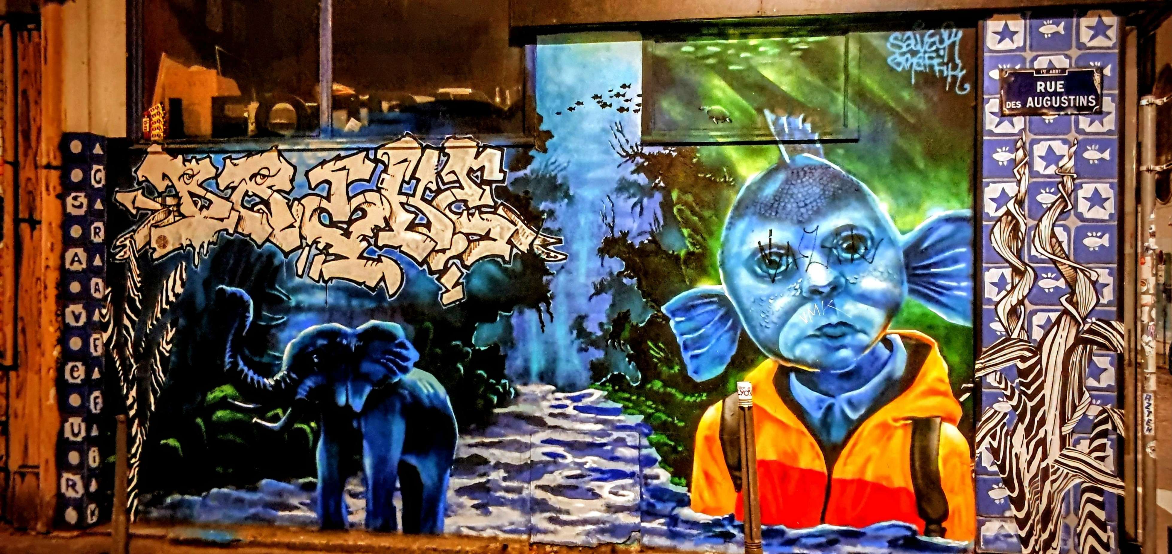 
								Street-art graffiti fresque 
								Saveur Graffik 
									36 Rue Sergent Blandan
									69001
									Lyon
									France 
									AnunaQi
								Street-Art-Safari.com
								